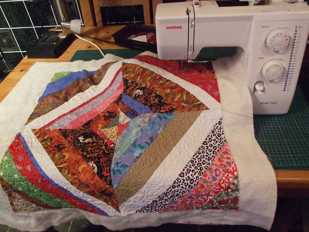 string quilt block and sewing machine