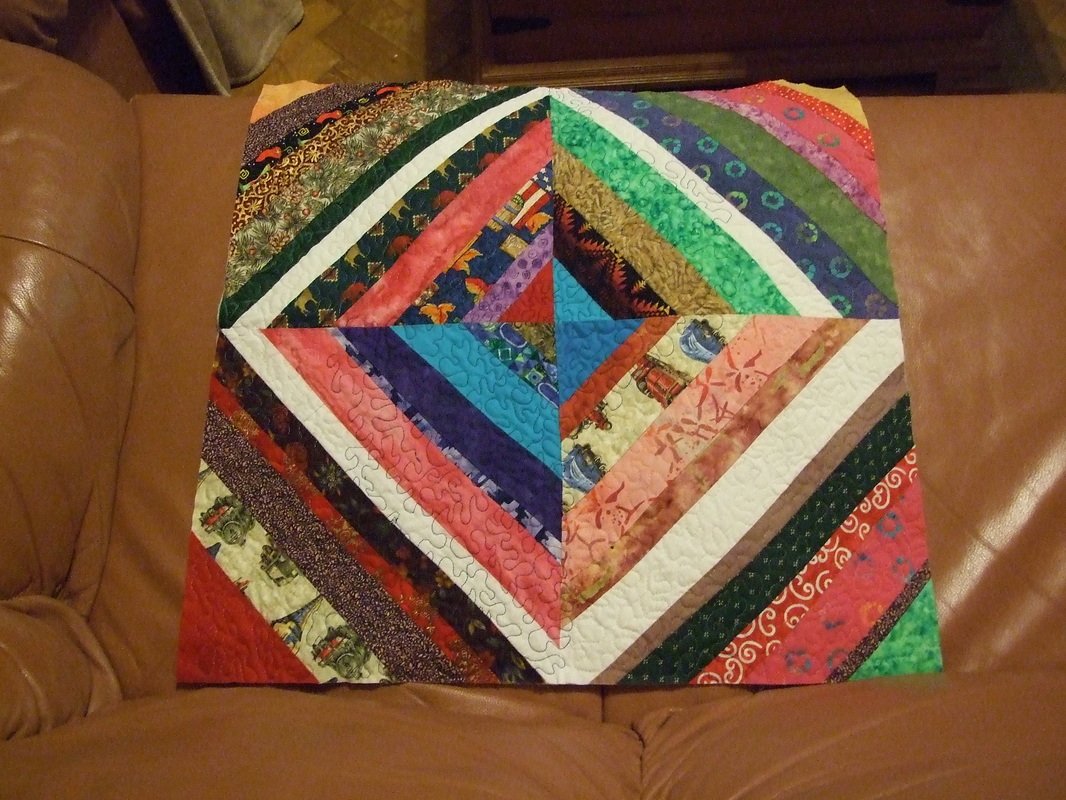 string quilt block and sewing machine